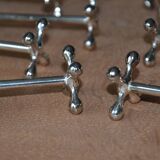 12 silver metal knife holders