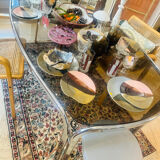 Vintage mid-century chrome and smoked glass table.