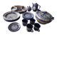 Vintage blue Taous dinnerware set of 21 pieces in very good overall condition.