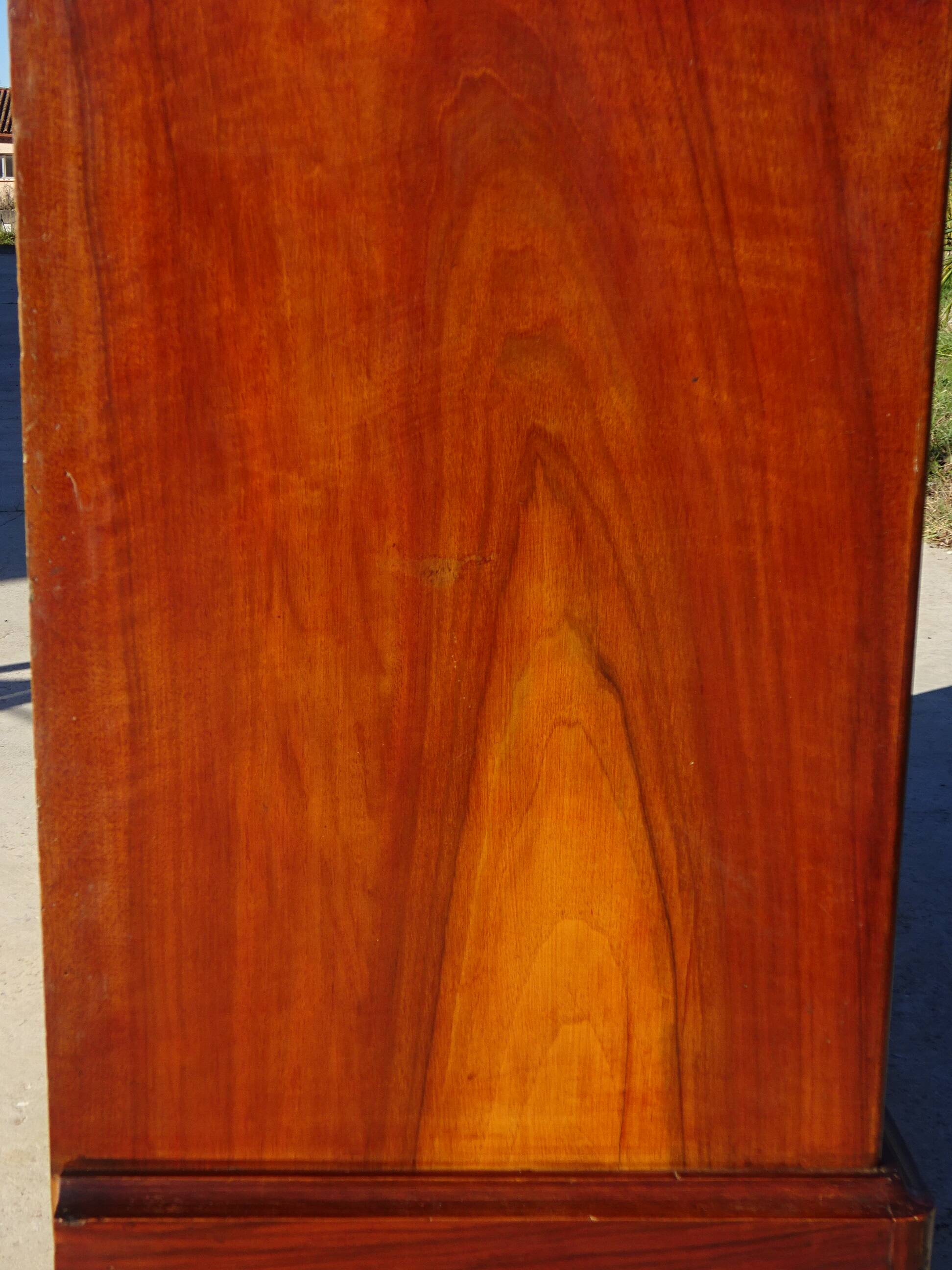 Antique mahogany chest of drawers with white marble.