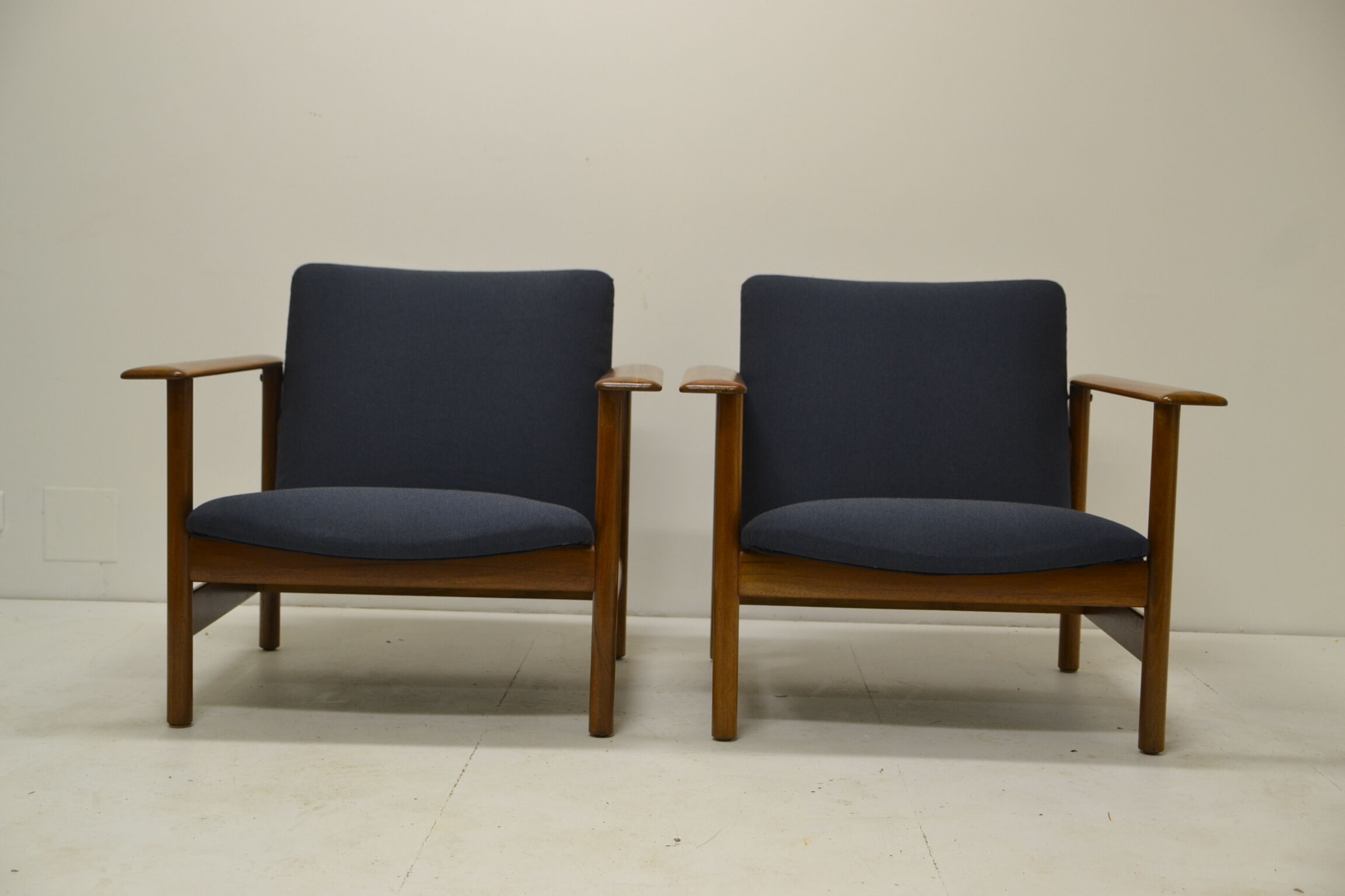 Pair of chairs of Gilbert Steiner mahogany and blue fabrics