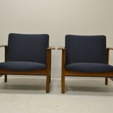 Pair of chairs of Gilbert Steiner mahogany and blue fabrics