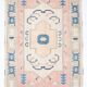 Tapis vintage en laine et coton pêche et bleu
