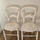 Pair of old white wooden chairs