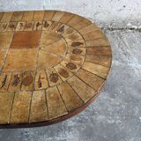 Roger Capron brown-ochre ceramic tile coffee table with wooden base, oval leaf-motif top
