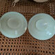 A pair of antique opaline coffee cups.