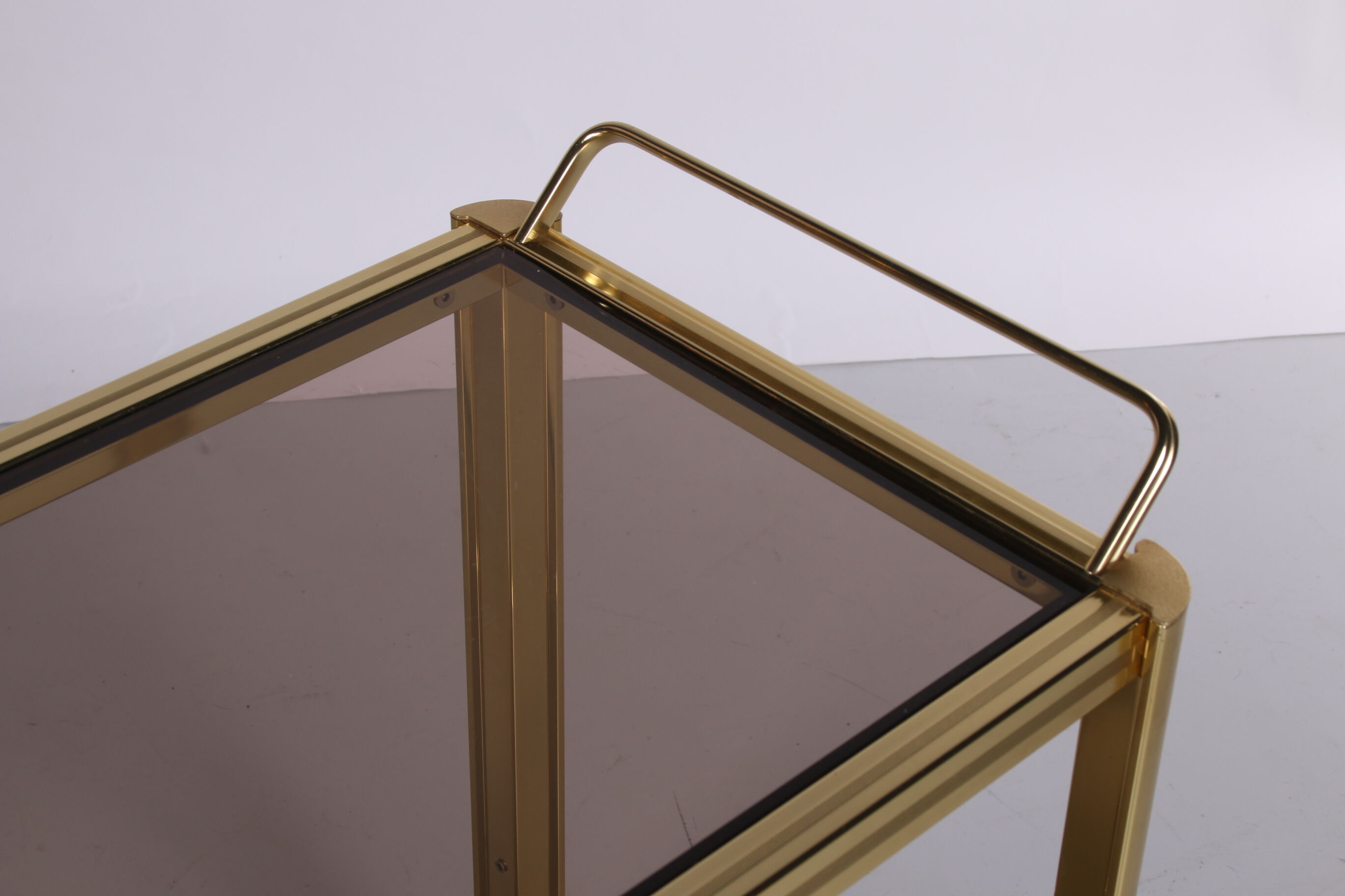 Hollywood Regency trolley with smoked glass