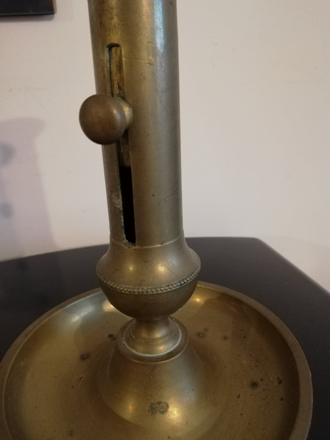 Brass bougeoir with pusher