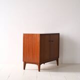 Storage cabinet with hinged doors