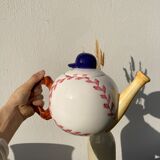 Teapot in white ceramic baseball