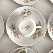 12 ironstone coffee cups with polychrome floral decoration, KG Lunéville