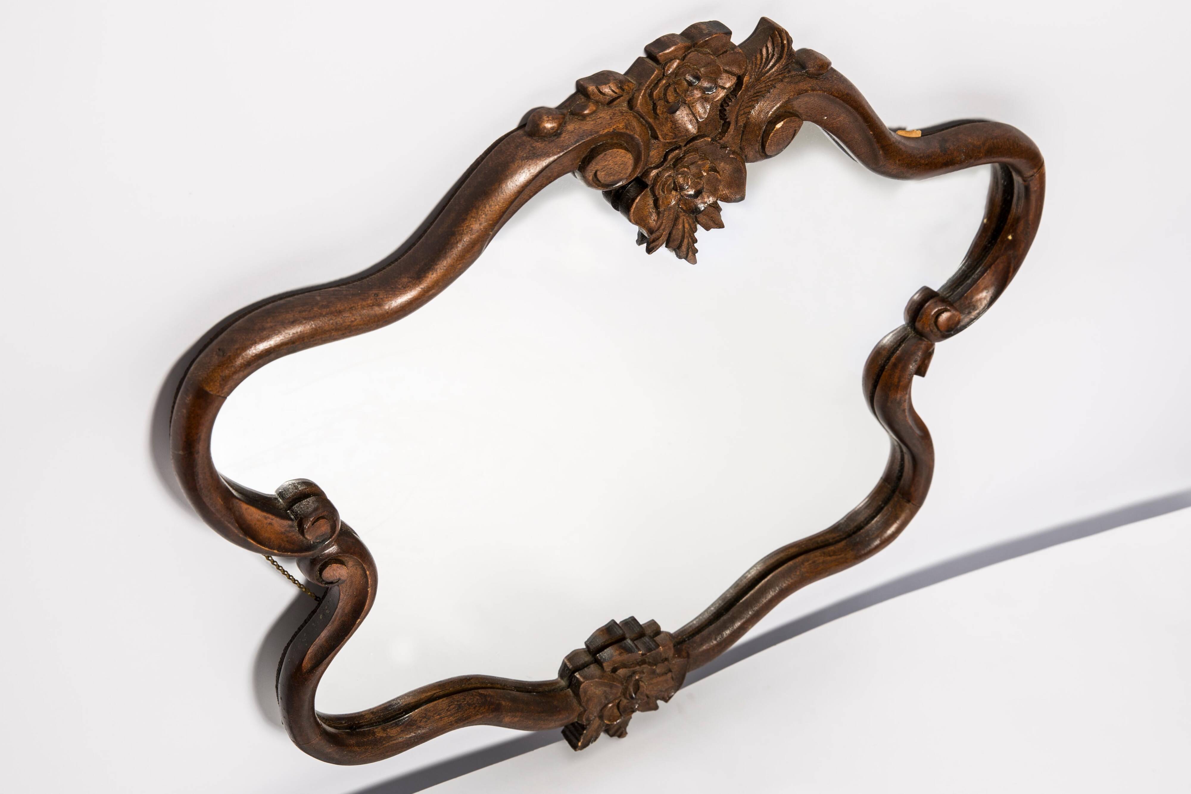 Medium vintage mirror in dark brown wood, Europe, 1960.