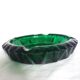 Green glass ashtray