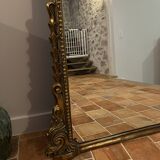 Large gilded mirror with pediment