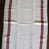 Old chevron towel with red and green stripes.