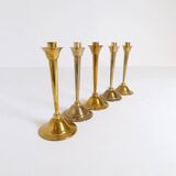 Mid-century set of 5 brass candlesticks by Lars Holmström, Arvika, Sweden.
