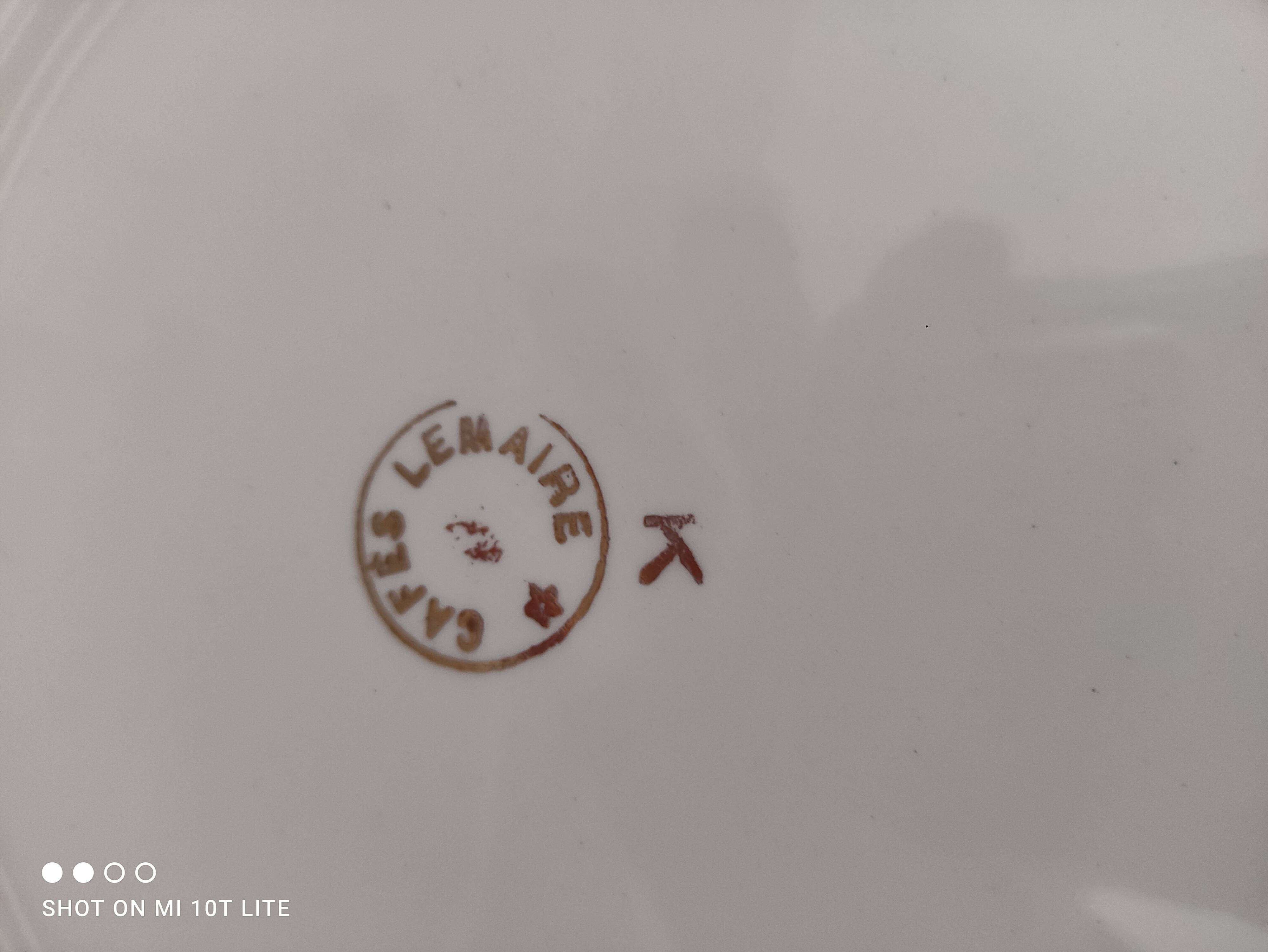 Round plate with aqua green rim and golden frieze, Cafés Lemaire.