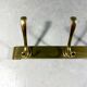 Gold coloured aluminium wall coat rack 1960’s