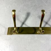 Gold coloured aluminium wall coat rack 1960’s