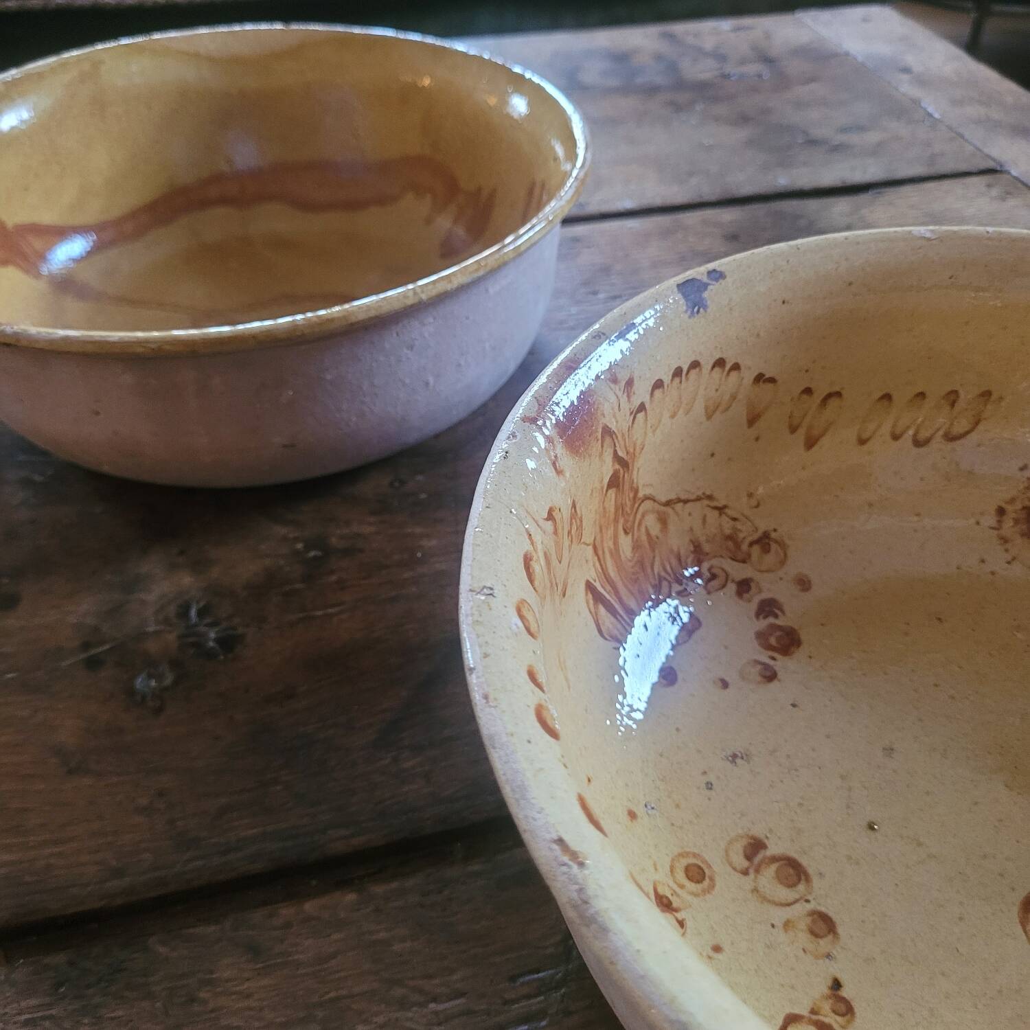 Two rustic glazed earthenware salad bowls, French craftsmanship, circa 1