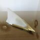 Art Deco wall light in brass and thick frosted glass.