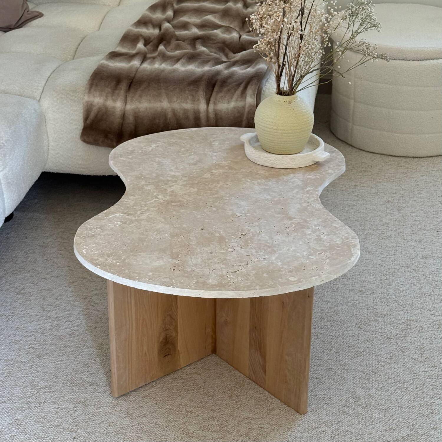 Cloud coffee table in travertine and dark oak.