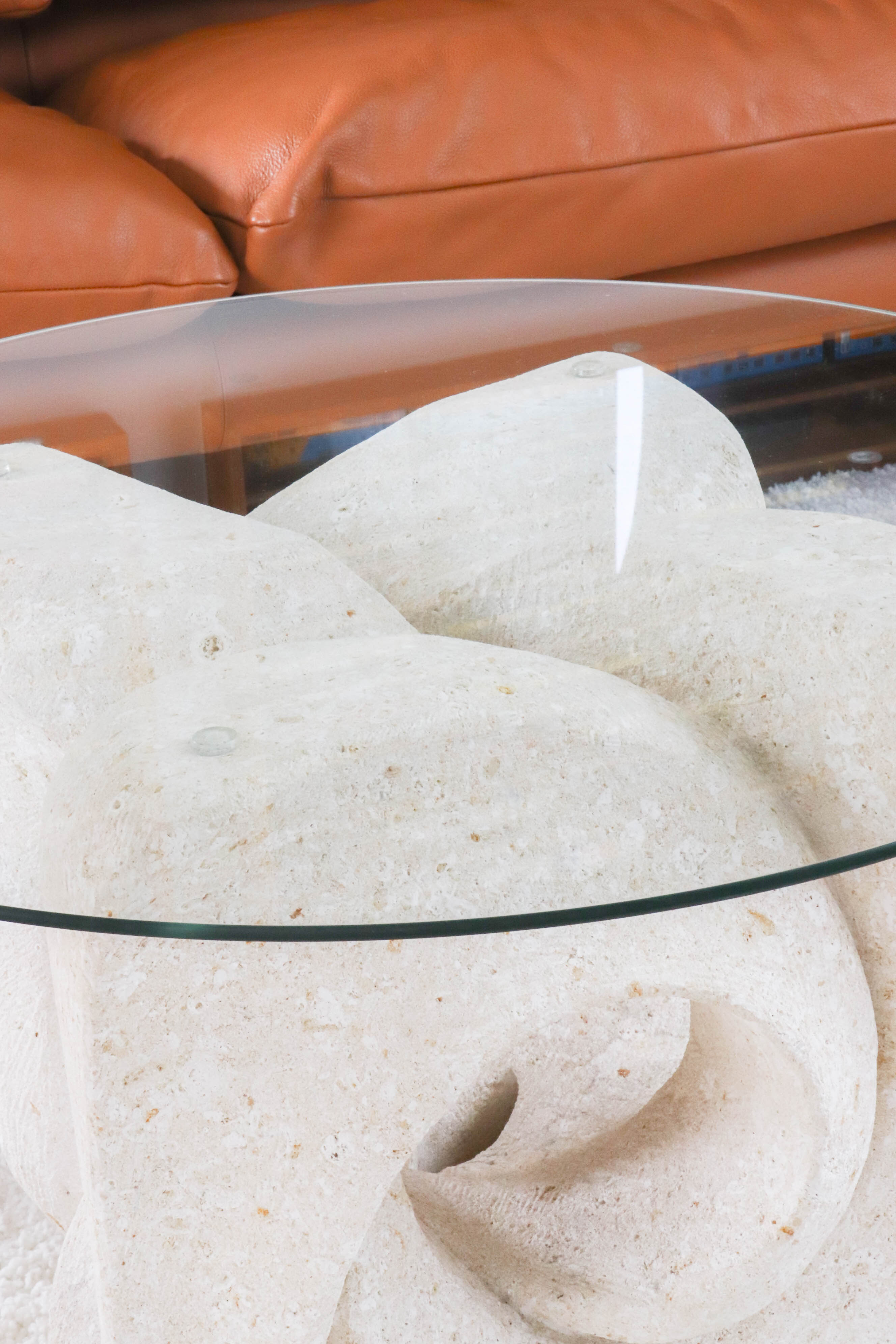 A Vintage White Stone Coffee Table with Glass Table Top
