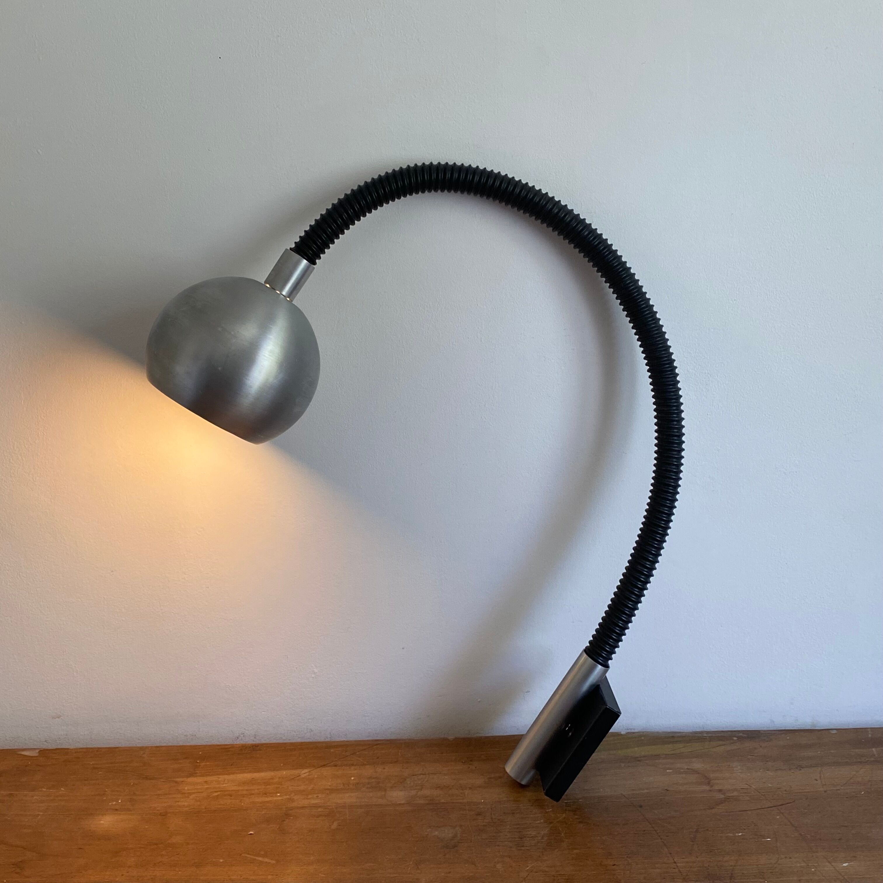 Flexible eye ball wall light by raak. 1970. 65x55cm.