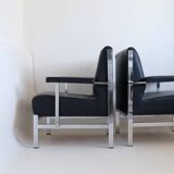 Pair of designer armchairs