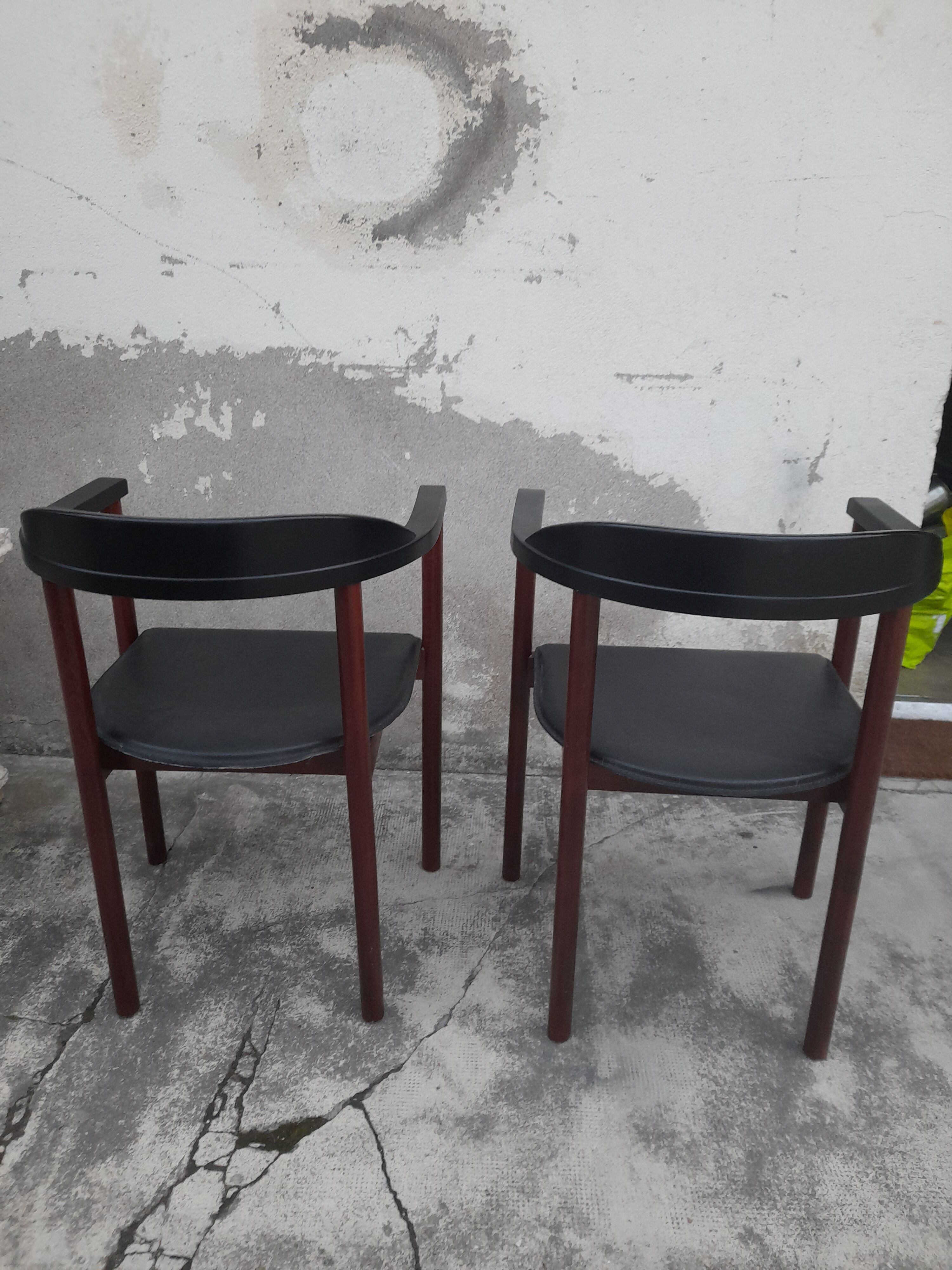 Pair of Scandinavian armchairs in teak and leather