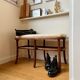 Wooden and beige cotton piano bench