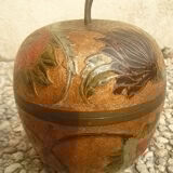 Partitioned brass apple