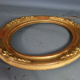 Oval frame nineteenth century gilded stucco wood and glass 36x31 foliage 28x23 cm