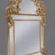 Regency style mirror in gilded wood, first half of the 19th century.