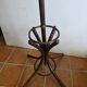 Curved antique wooden parrot