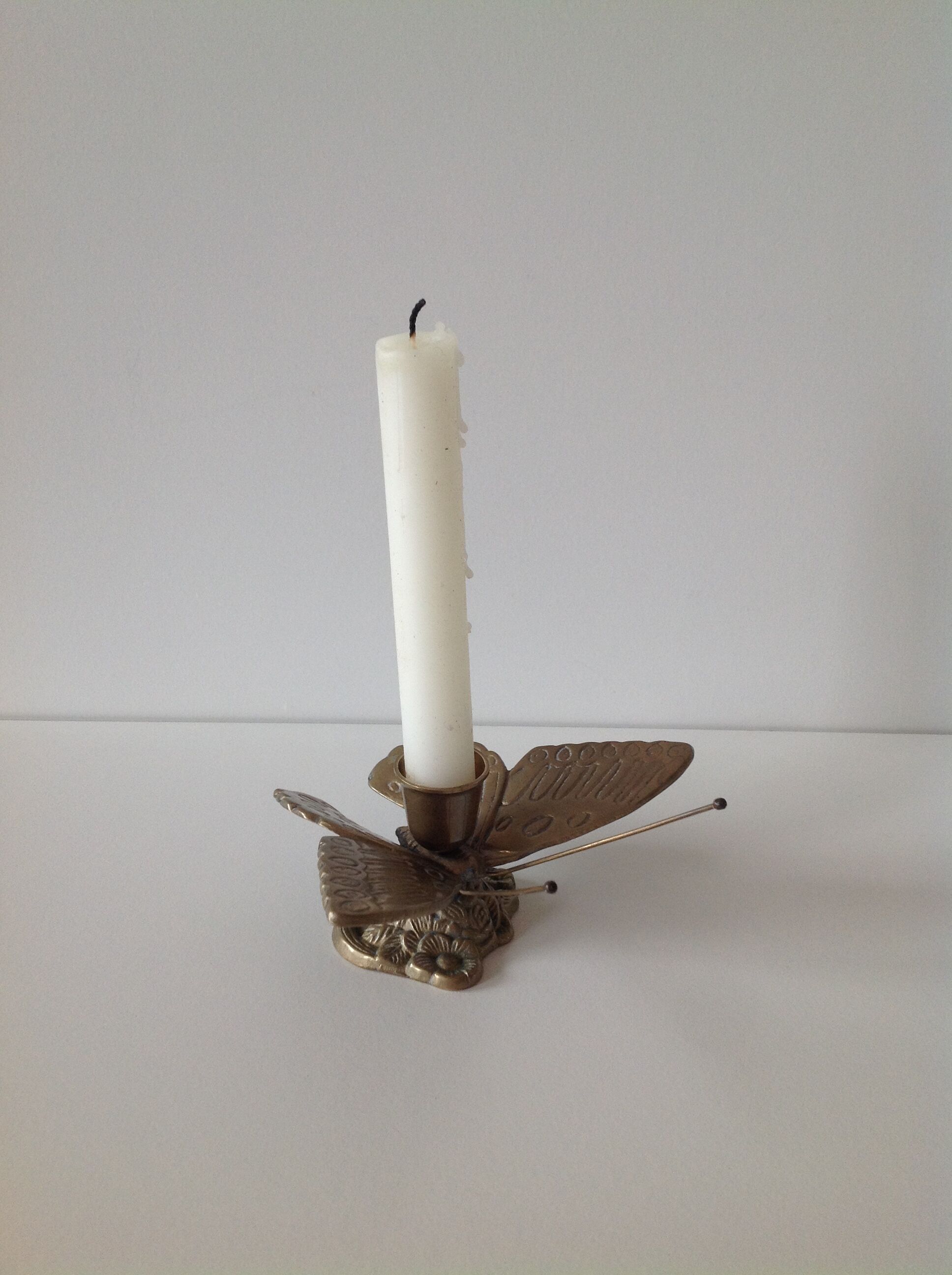 Brass butterfly candlestick