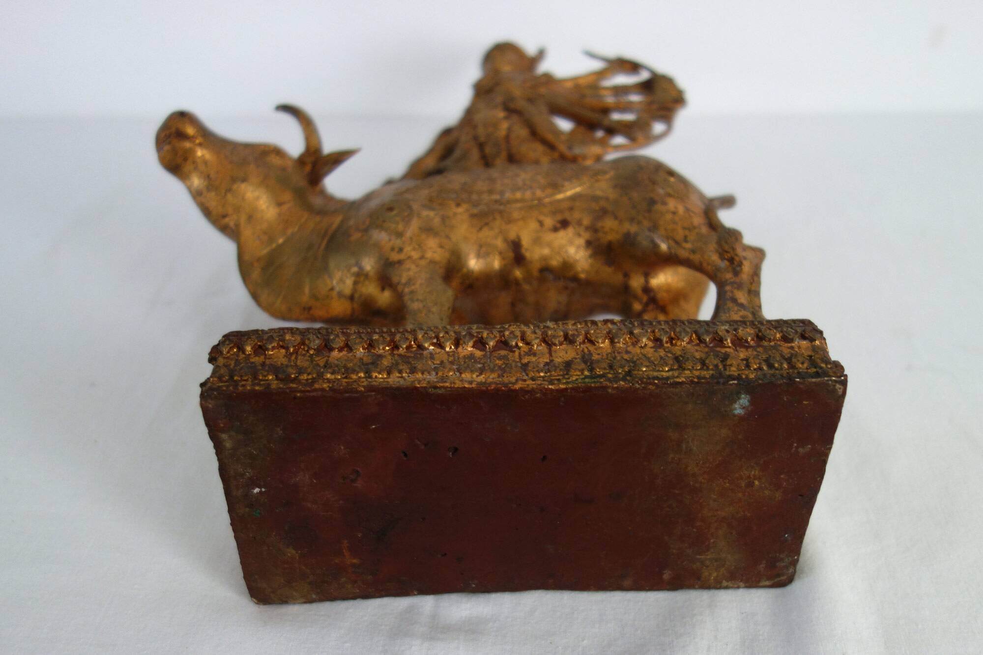 Golden bronze statue of Shiva on Nandi, India, mid-20th century.