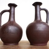 pair of terracotta bottles or carafes