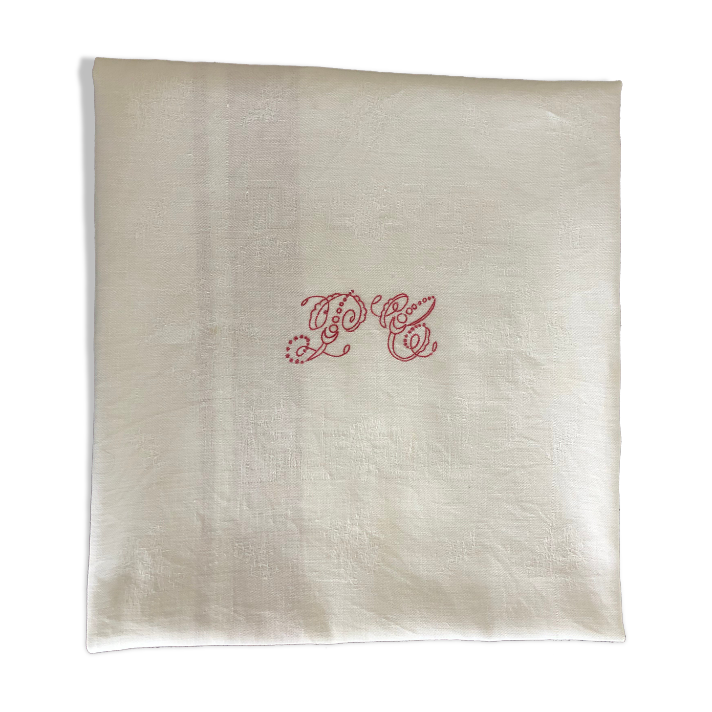 Ancient damask tablecloth with monogram