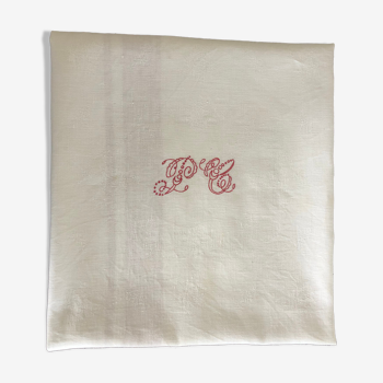Ancient damask tablecloth with monogram