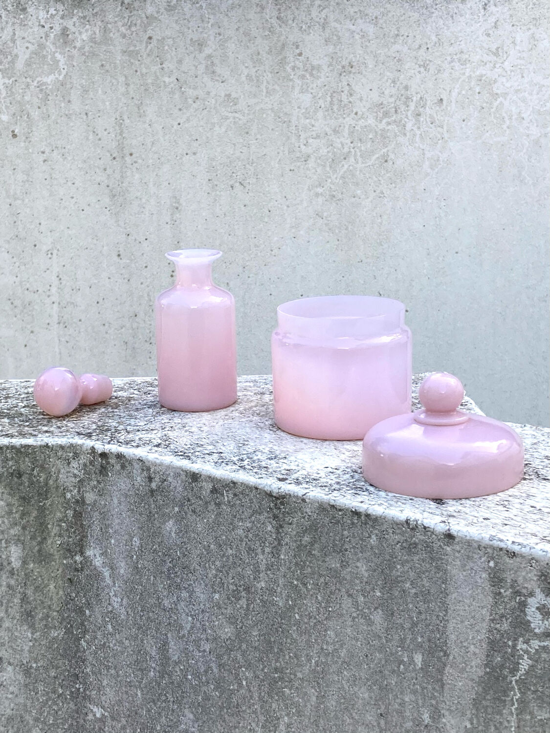 Two pink opaline bottles