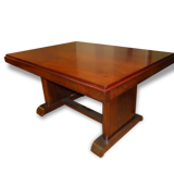 Modernist dining table in rosewood veneer.