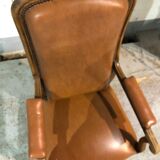 Old Voltaire armchair in light brown leather