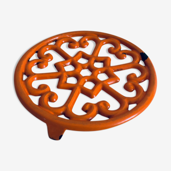 Orange cast iron dish underside