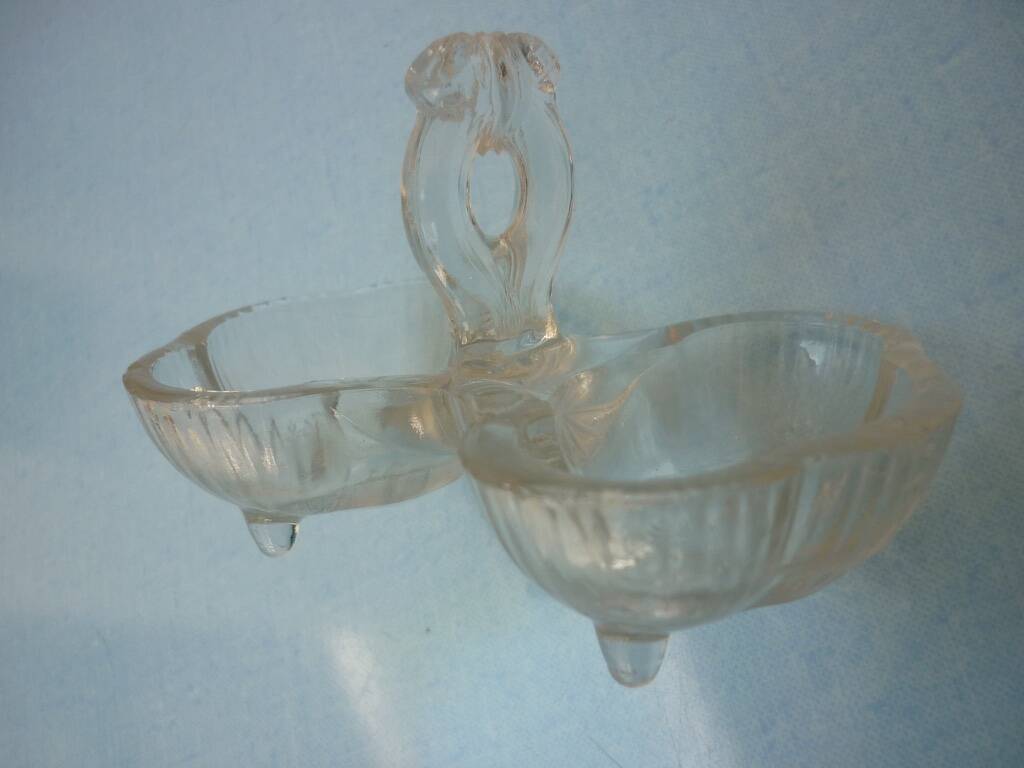 Molded glass salt and pepper service on feet