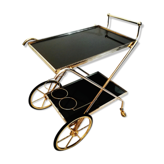 Golden brass trolley wheeled dessert and glass trays