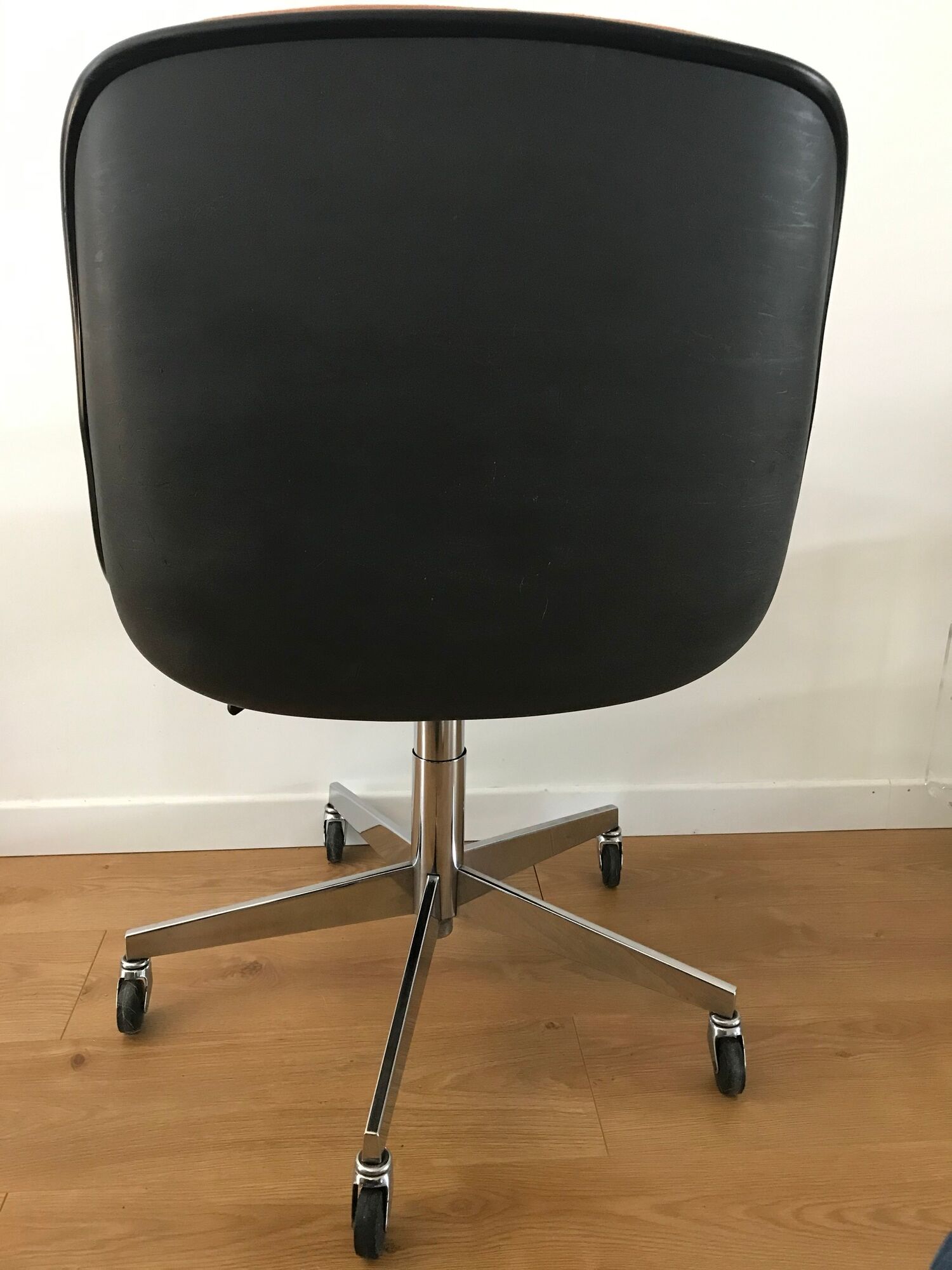 Vintage orange armchair model 451 with wheels by Steelcase Strafor, design by Randall Buck