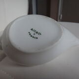 Old white porcelain pourer