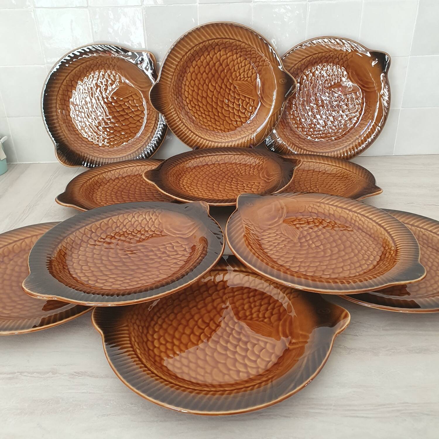 Sarreguemines / 11 earthenware fish-shaped plates