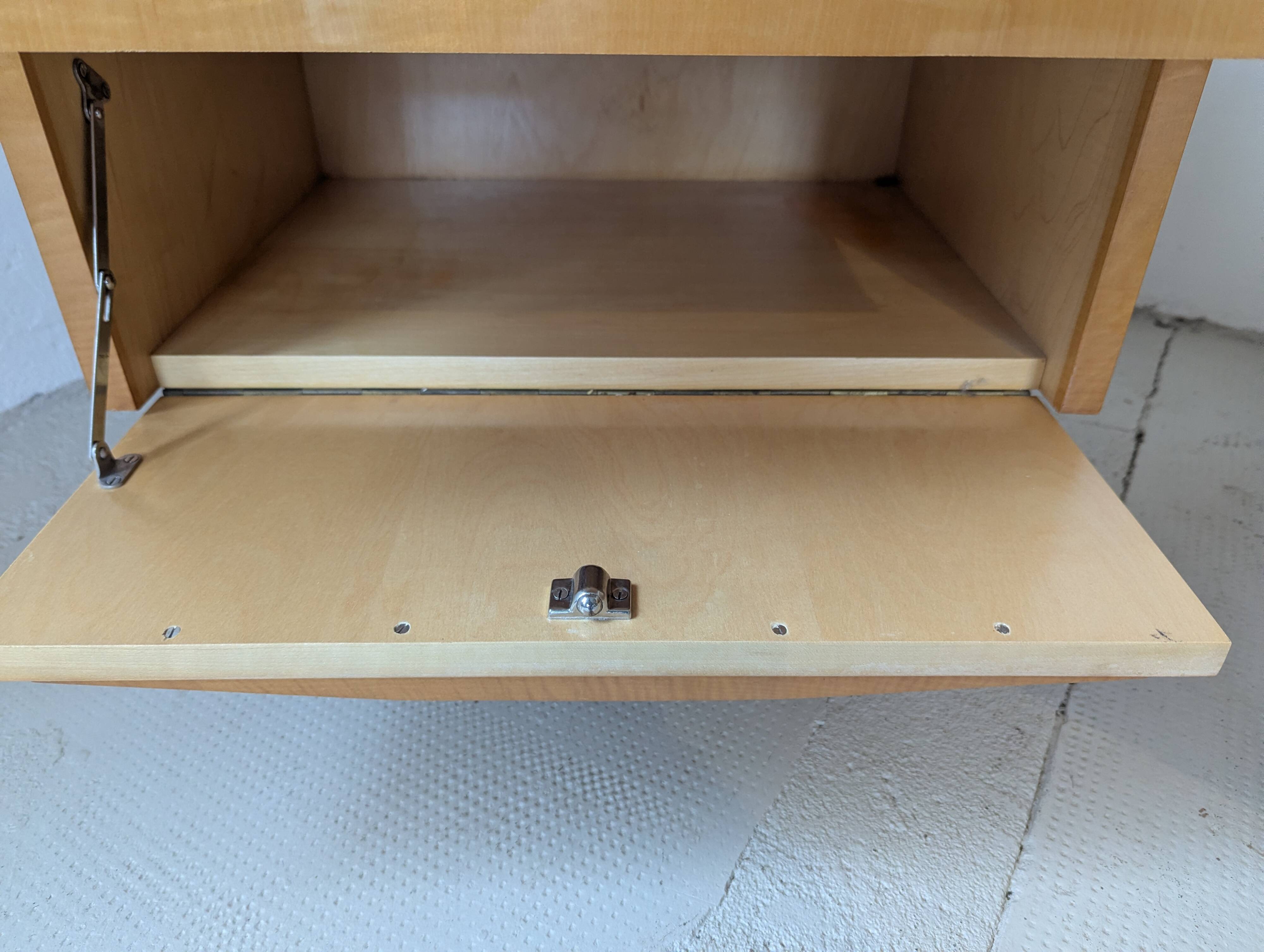 Pair of bedside tables in light wood